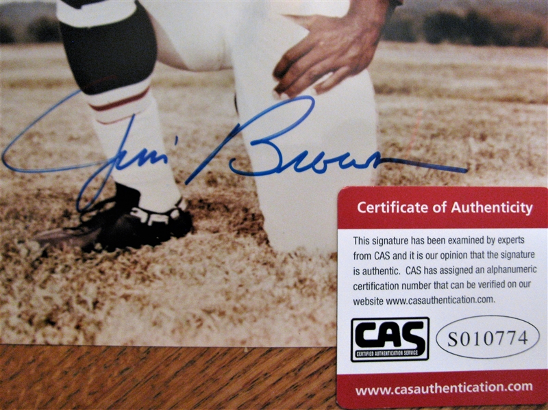 JIM BROWN SIGNED COLOR PHOTO /CAS AUTHENTICATED
