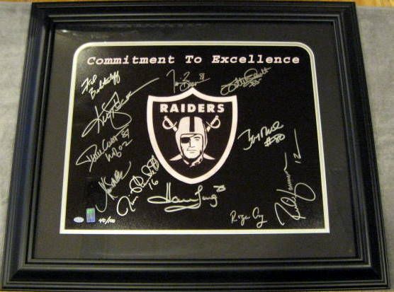 OAKLAND RAIDERS SIGNED POSTER w/JSA LOA